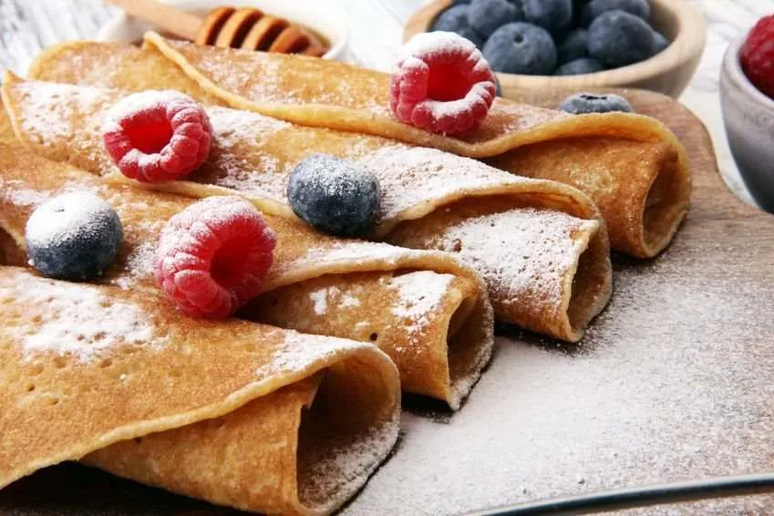 Crêpière poignée fonte 
