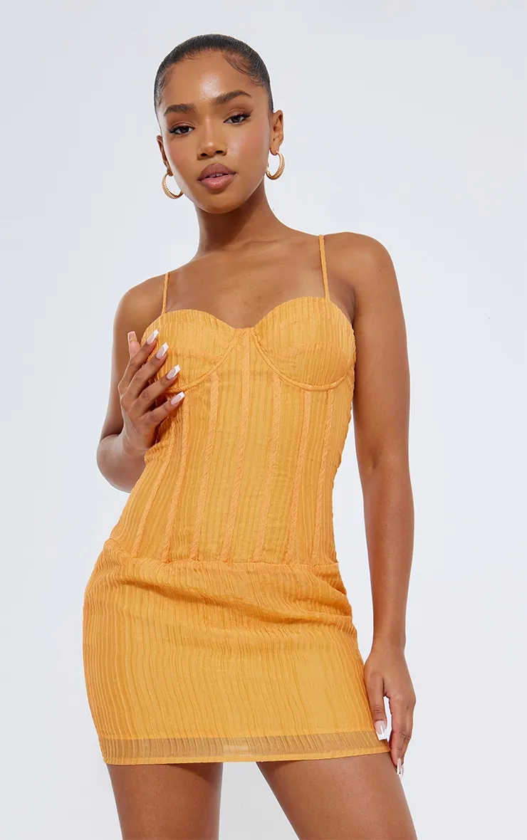 Robe moulante orange texturée à bretelles et détail corset